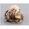 Image 2 : An ivory netsuke of an octopus and piebald cat.