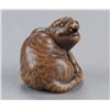 Image 1 : A wood netsuke of a tiger.