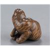 Image 3 : A wood netsuke of a tiger.