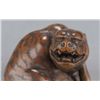 Image 6 : A wood netsuke of a tiger.