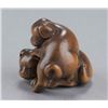 Image 2 : A wood netsuke of two puppies.