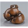 Image 3 : A wood netsuke of two puppies.