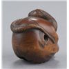 Image 4 : A wood netsuke of a snake and skull.