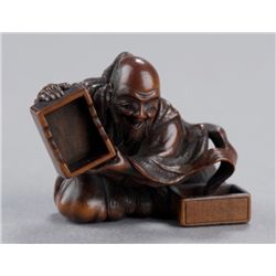 A boxwood netsuke of Urashima Taro.