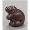 Image 4 : A wood netsuke of a monkey.