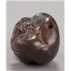 Image 5 : A wood netsuke of a monkey.