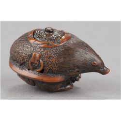 A kurumi netsuke of Bumbuko Chagama.