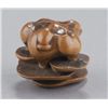 Image 7 : A boxwood netsuke of mushrooms.