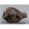 Image 5 : A wood netsuke of a monkey held in Eagle's Claw.