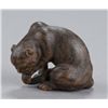 Image 1 : A wood netsuke of a tiger.