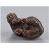 Image 5 : A wood netsuke of a tiger.