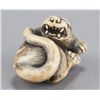 Image 2 : An ivory netsuke of a tiger.