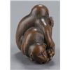 Image 4 : A wood netsuke of two monkeys.