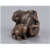 Image 2 : A wood netsuke of a tigress and cub.