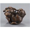 Image 7 : A wood netsuke of a tigress and cub.
