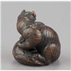Image 3 : A wood netsuke of a tiger on bamboo.
