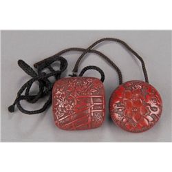 A group of two tsuishu lacquer manju.