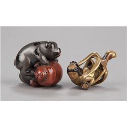 A group of two lacquer netsuke.