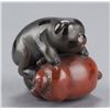 Image 8 : A group of two lacquer netsuke.