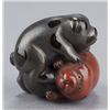Image 9 : A group of two lacquer netsuke.