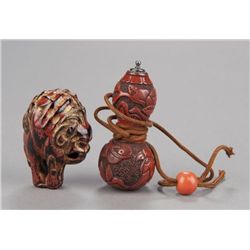 A group of two lacquer netsuke.