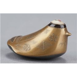 A gold lacquer netsuke of a sparrow.