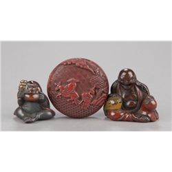 Group of three lacquer netsuke.