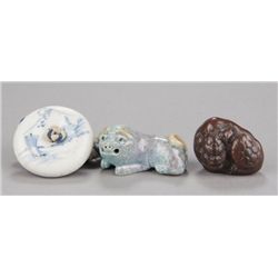 A group of three netsuke, various materials.