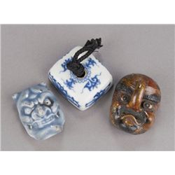 A group of three netsuke, various materials.