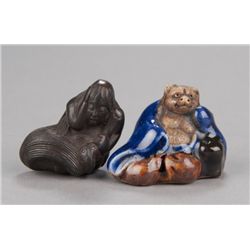 A group of two pottery netsuke.