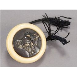 A shibuichi and ivory kagamibuta, Hotei.