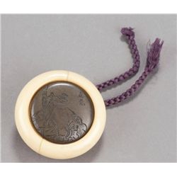 A shibuichi and ivory kagamibuta, Emma-O.