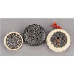 Group of three metal netsuke.