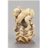 Image 2 : A marine ivory netsuke of a fisherman and fish.