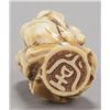 Image 5 : A marine ivory netsuke of a fisherman and fish.