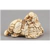 Image 2 : A carved ivory netsuke of an elephant.