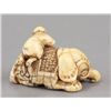 Image 4 : A carved ivory netsuke of an elephant.