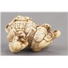 Image 7 : A carved ivory netsuke of an elephant.