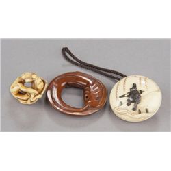 A group of three netsuke, various materials.
