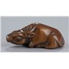 Image 1 : A wood netsuke of an ox.