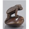 Image 1 : A wood netsuke of Kappa on a clamshell.