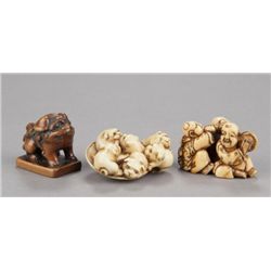A group of three netsuke, various materials.