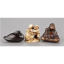 A group of three netsuke, various materials.