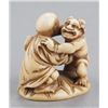 Image 2 : A group of three netsuke, various materials.