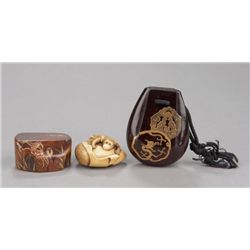 A group of three netsuke, various materials.