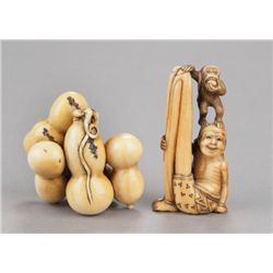 A group of two ivory netsukes.