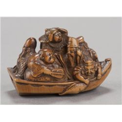 A wood netsuke of Takarabune.