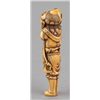 Image 3 : An ivory netsuke of a foreigner carring Tama.