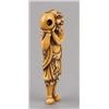 Image 6 : An ivory netsuke of a foreigner carring Tama.
