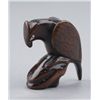 Image 3 : A wood netsuke of a falcon.
